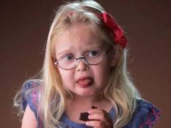 “Kids tasting dark chocolate for the first time”